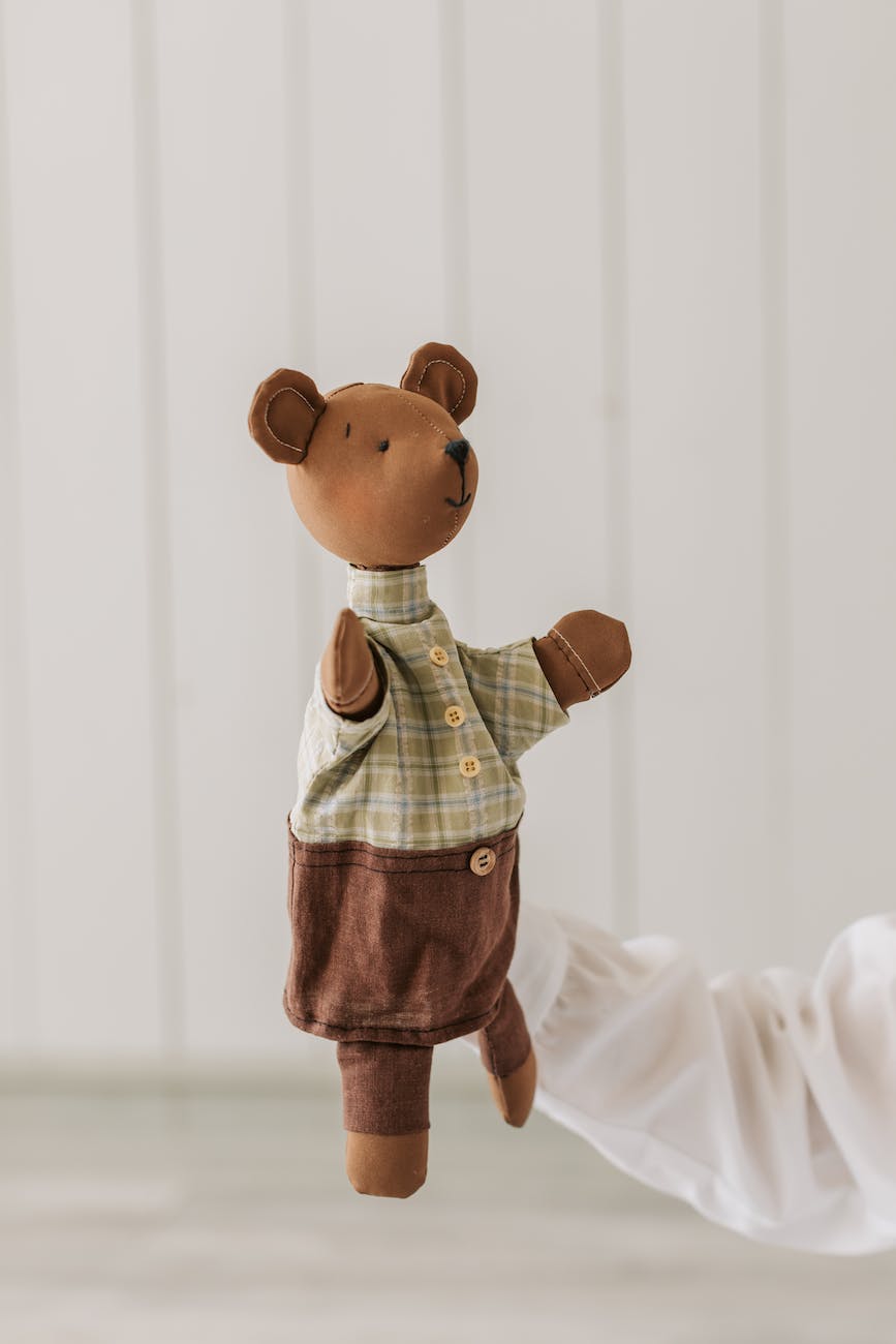 a brown plush toy puppet